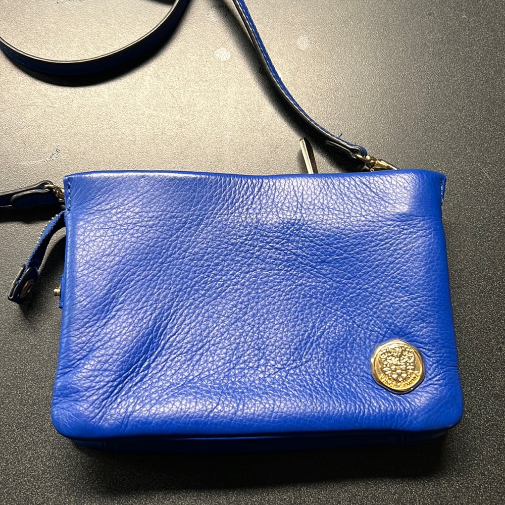 Blue, Vince camuto  crossbody, 8” by 6” with many pockets inside